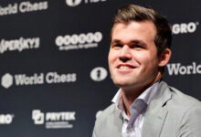 Минута отдыха Карлсен перед матчем с Непомнящим посетил игру «Боруссии» и получил подарок от Холанда Спорт 